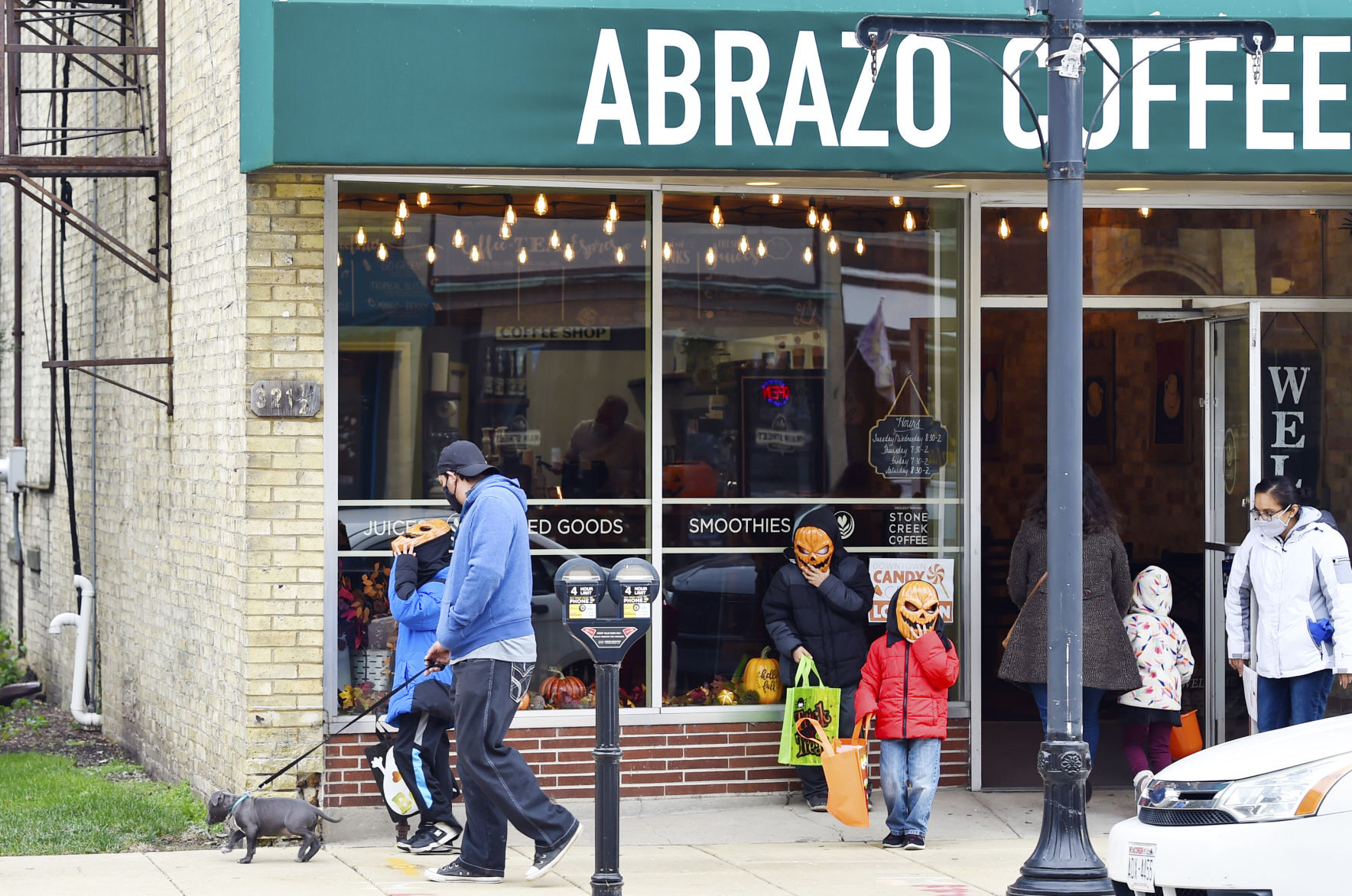 A family of masks at Abrazo Coffee